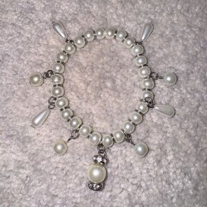 Vintage bracelet with pearl charms and silver details
